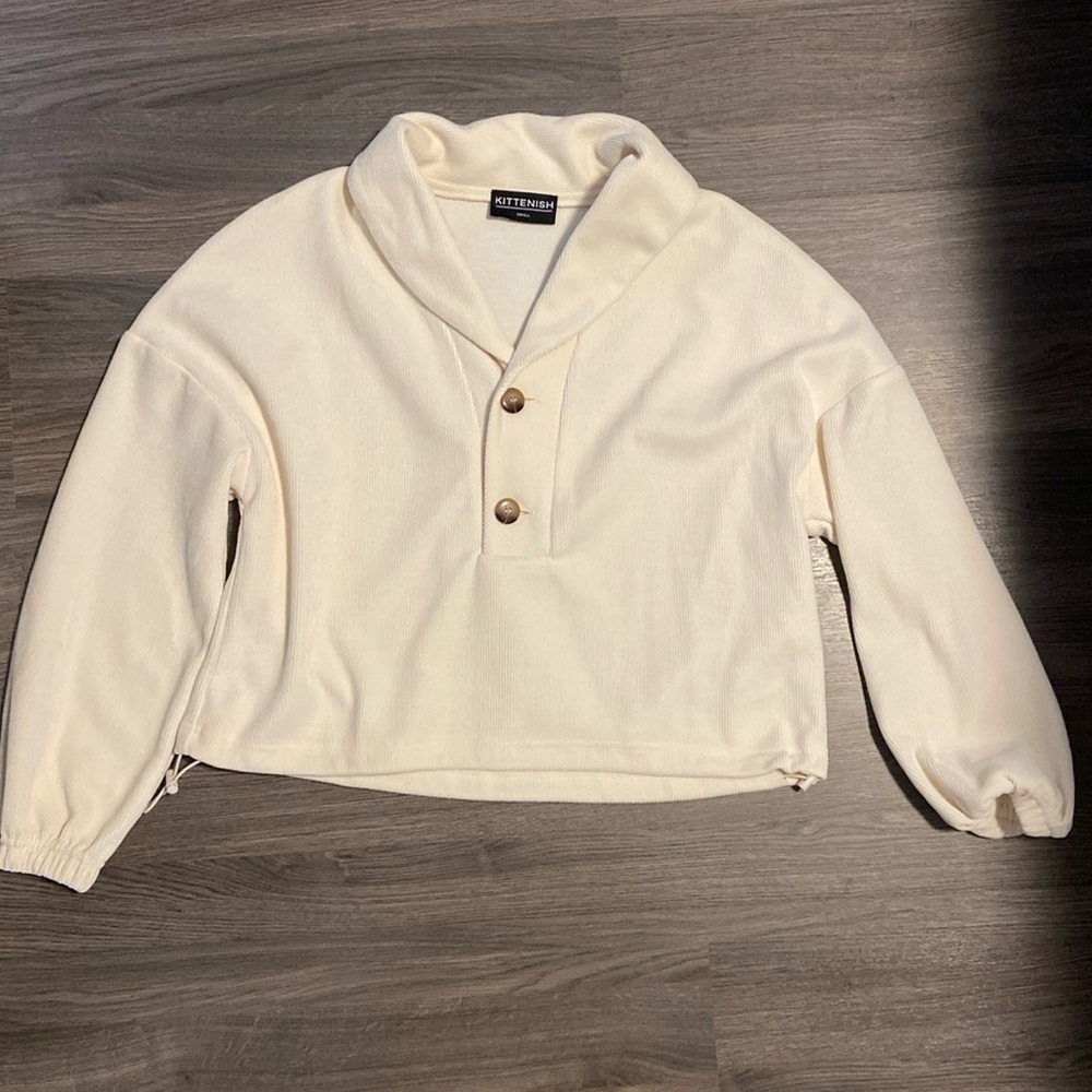 Kittenish - cropped sweater with ties at the bottom to make it tighter on waits